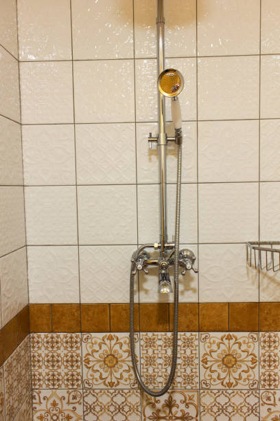 istock Shower on bathroom on metal rack. No running water. 898387906