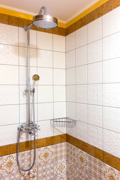 istock Shower on bathroom on metal rack. No running water. 898387946