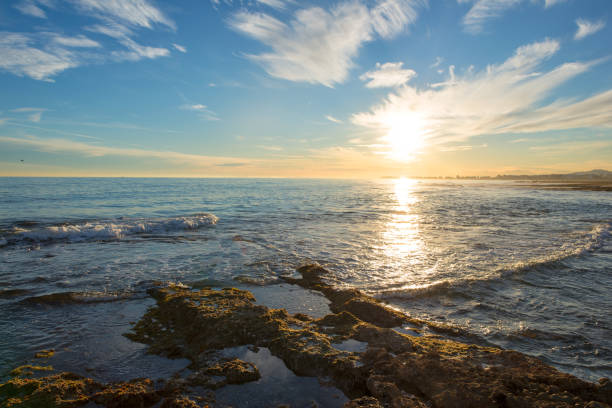 istock The calm sea in a very cloudy sunset 898390552