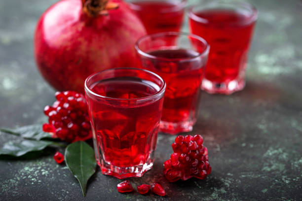 istock Glasses of fresh pomegranate juice. 898391070