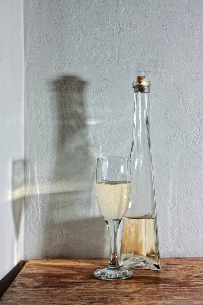 istock bottle and a glass of dry wine 898394028