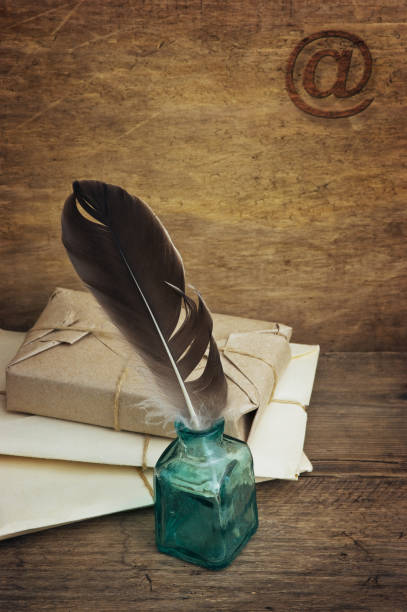 istock Postage on the background of an old board 898394190