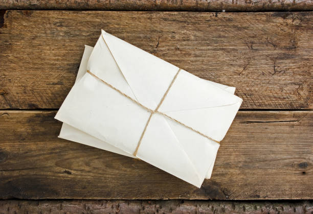 istock Postage on the background of an old board 898394458