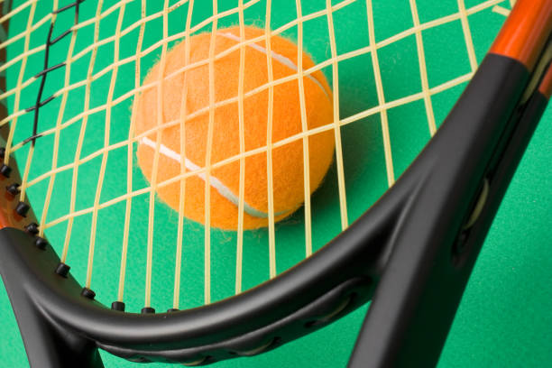 istock tennis racket and a ball 898394486