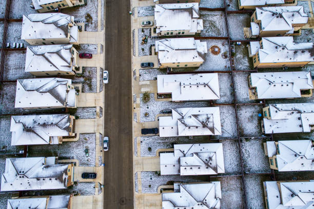istock Straight down Drone View Austin Snow Day Rooftops in Suburb Covered in Snow 898395082