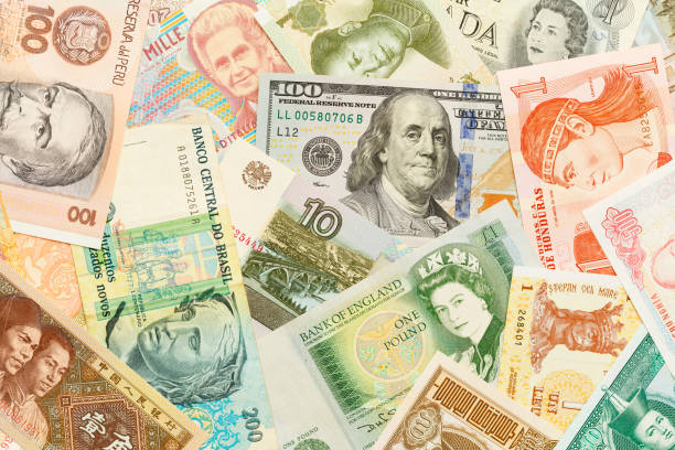 World Money Various World Cash Money Types Spread Out. dutch guilders stock pictures, royalty-free photos & images