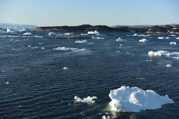 istock Arctic icebergs on arctic ocean in Greenland 898400048