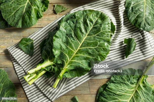 Raw Green Organic Collard Greens Stock Photo - Download Image Now - Collard Greens, Kale, Leaf