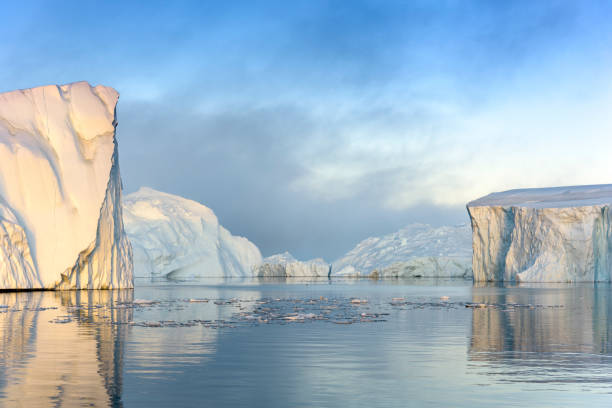 istock Massive icebergs on arctic ocean in Greenland 898402942