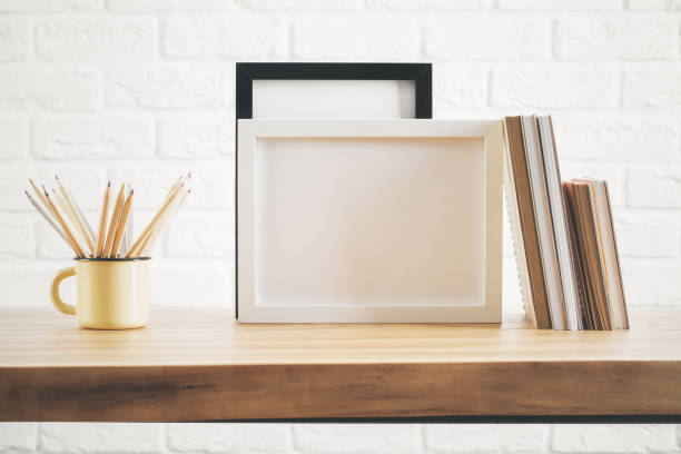 istock Desk top with picture frame and supplies 898403578