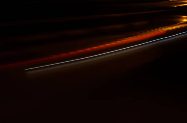 istock Trails of the car lights 898404286