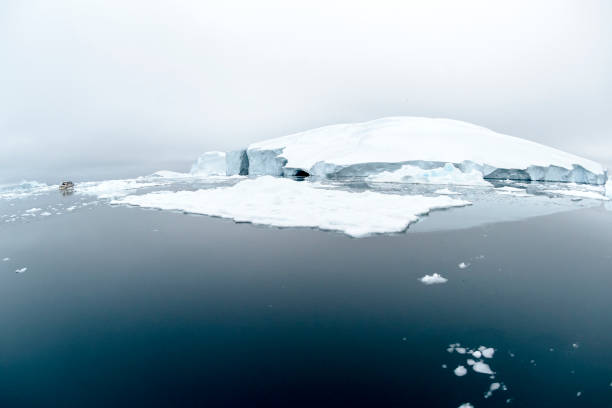 istock Arctic icebergs on arctic ocean in Greenland 898411560
