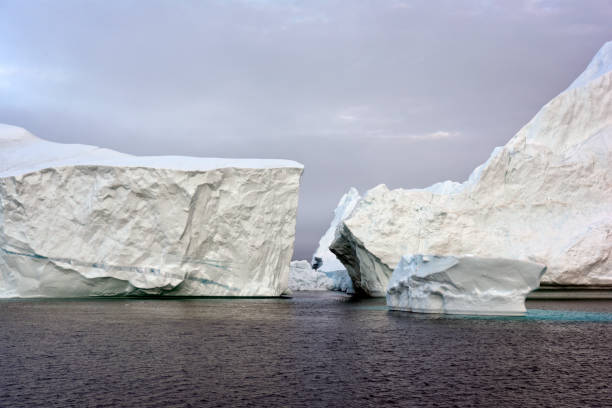 istock Arctic icebergs on arctic ocean in Greenland 898412134