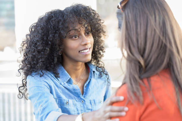 istock Young woman has serious conversation with friend 898424672