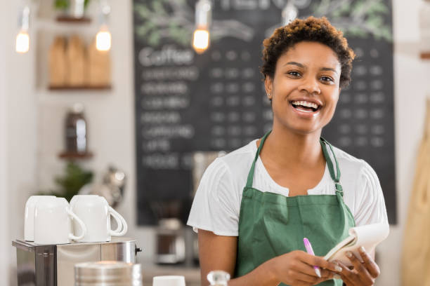 istock Confident young coffee shop owner 898424806