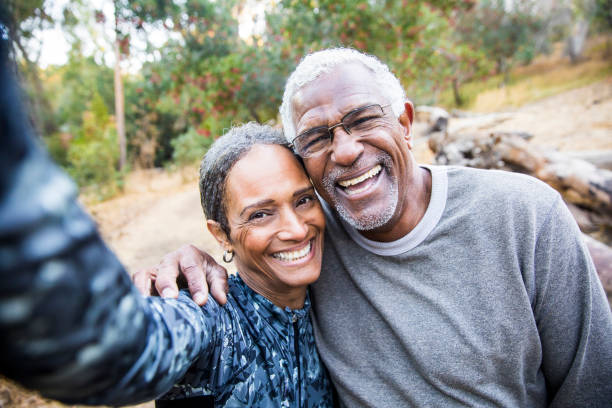 istock Senior Black Couple Taking Selfie During Exercise 898430770
