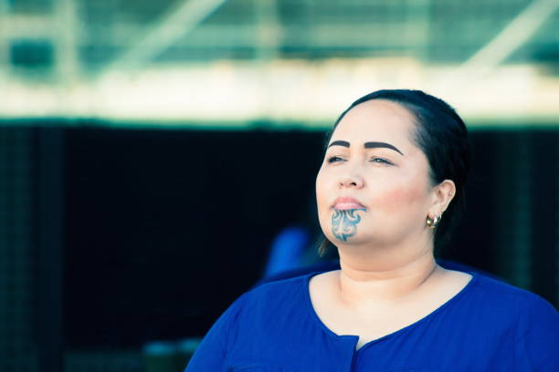A beautiful Maori businesswoman outdoors in the workplace stock photo
