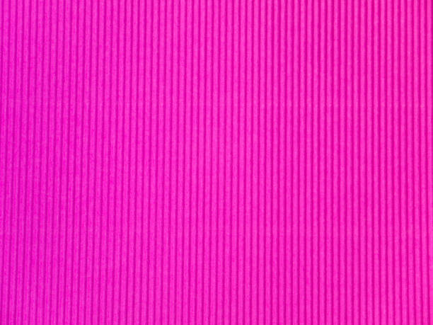 istock Bright purple corrugated paper texture closeup. 898432732