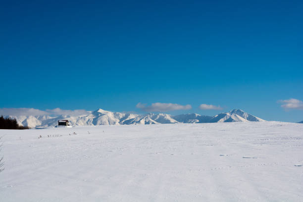 istock Snowy Mountains and blue sky Tokachi mountain range 898434398