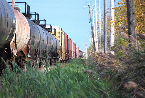 istock Passing Train, Freight and Oil Cars. 898434678