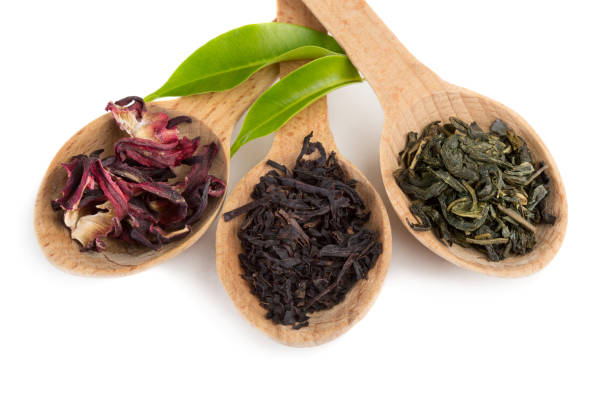 istock Green and black tea leaves 898434856