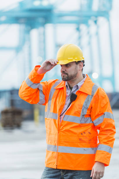 istock Man working at shipping port 898438474