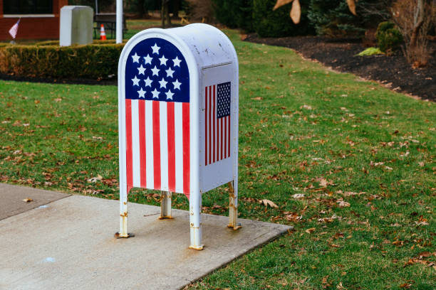 istock Home office American flagMetal Mailbox in garden 898439266