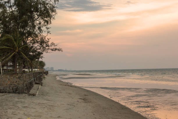 istock beautiful sunset sky and beach 898440252
