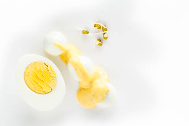 istock chicken and quail eggs are covered with sauce. Protein and yolk 898441294