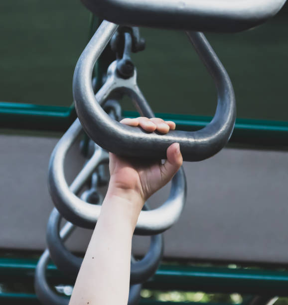 istock Single young hand grabbing sports ring. 898441536