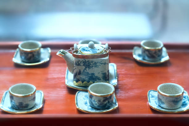 istock Set of teapots and the old tea cup on the table 898442934