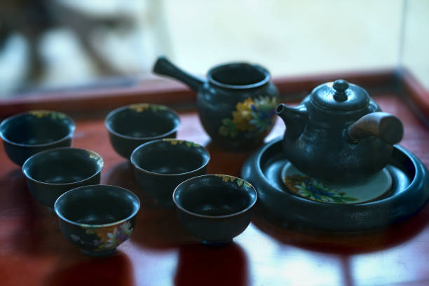 istock Set of teapots and the old tea cup on the table 898442938