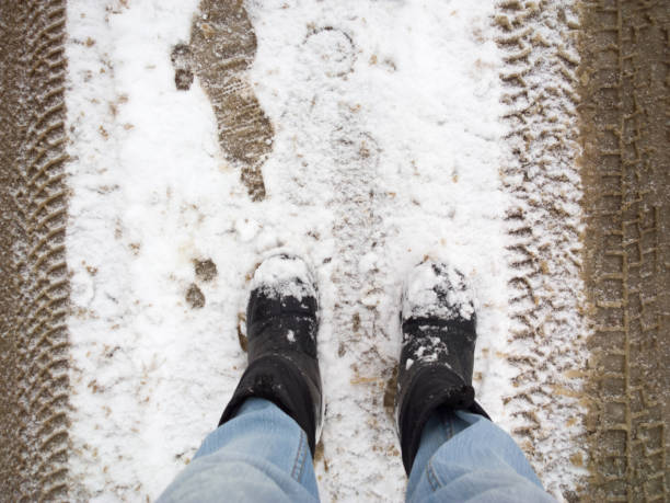 istock Feet in the snow. 898447560