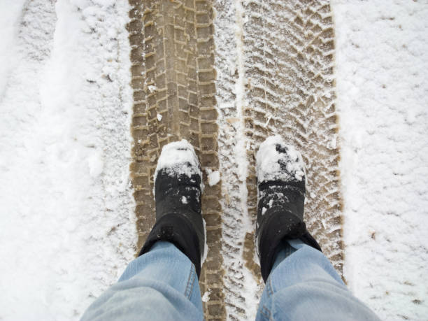 istock Feet in the snow. 898447562