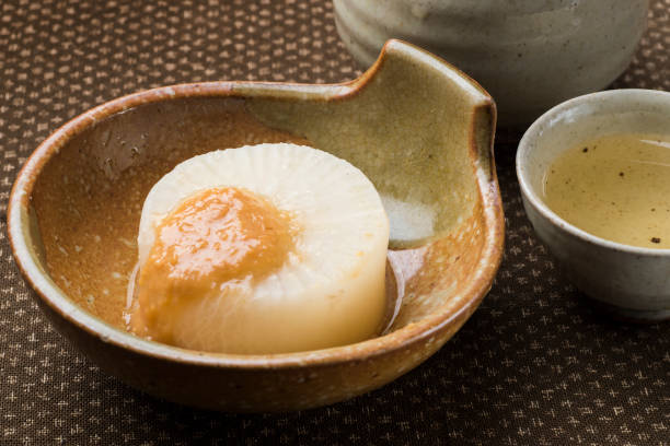 istock Hurohuki-daikonn and sake 898449514