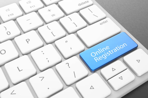 istock Modern computer keyboard with blue online registration button. 3D illustrating. 898450298
