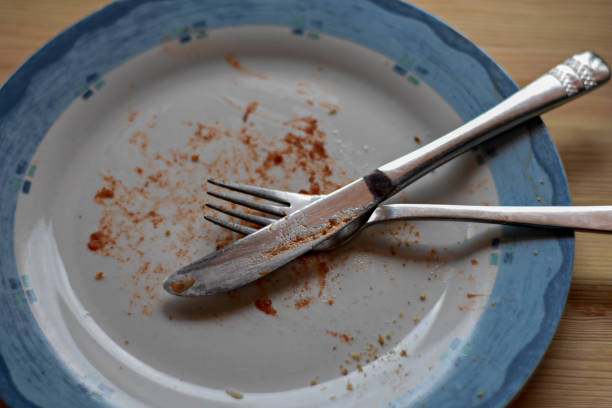 istock Dirty dishes after eaten with knife and fork. 898450804