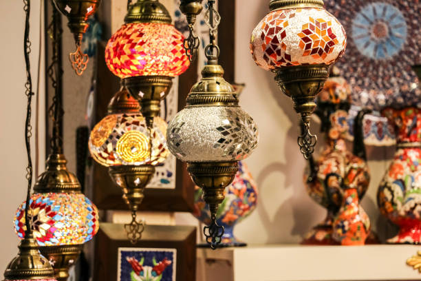 Traditional bright decorative hanging Turkish lights and colourful light lamps with vivid colours  in Turkey Pavilion, Global Village, Dubai, United Arab Emirates stock photo
