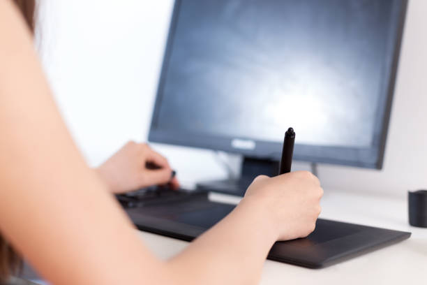 young chinese woman graphic designer works in modern office. 4k