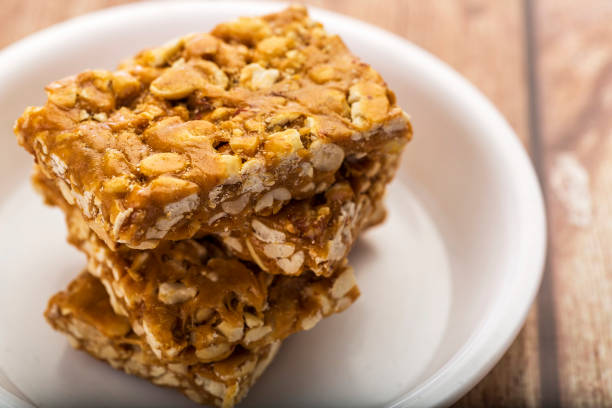 istock peanut brittle or groundnut chikki with jaggery 898452602
