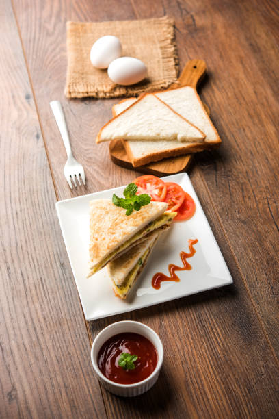 istock Indian Bread omelette / omlet / omlete sandwich served with tomato ketchup 898453768