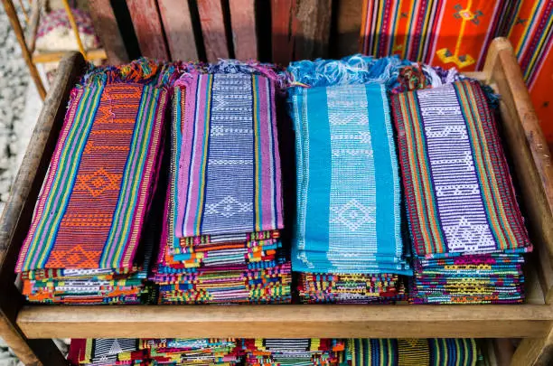 traditional hand woven tais fabric scarves in dili souvenir market east timor leste