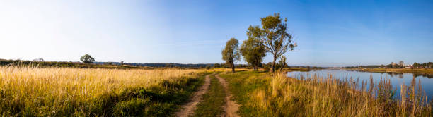 istock Road near the lake 898454838