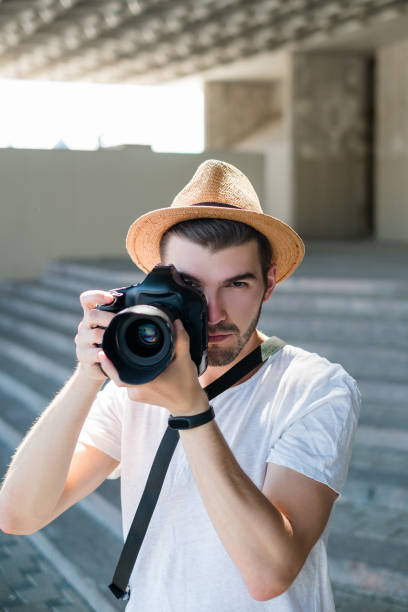 istock professional photographer lifestyle camera art 898455068