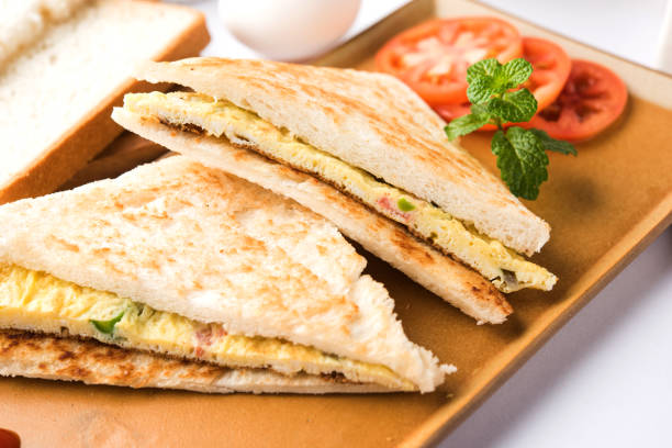 istock Indian Bread omelette / omlet / omlete sandwich served with tomato ketchup 898455290