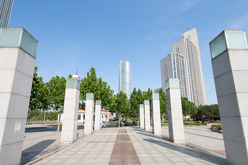 modern buildings in midtown of tianjin in blue cloud sky