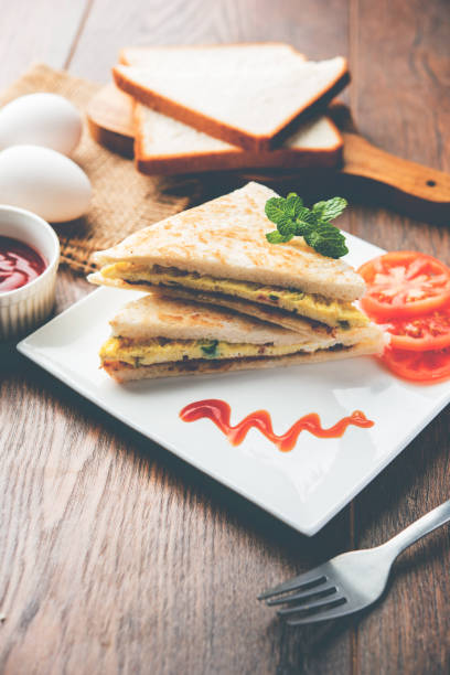 istock Indian Bread omelette / omlet / omlete sandwich served with tomato ketchup 898455468