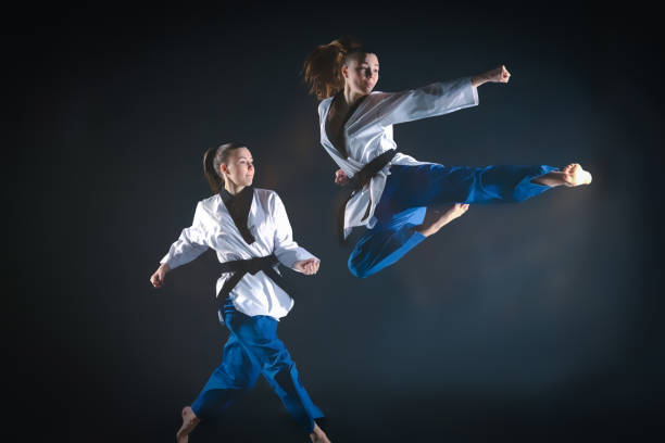 The Karate Girl With Black Belt Stock Photo - Download Image Now - Karate,  Motion, One Woman Only - iStock