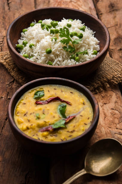 istock Basmati Rice Pilaf or pulav with Peas, or vegetable rice using green peas also known as matar pulav, served with plain dal 898457008