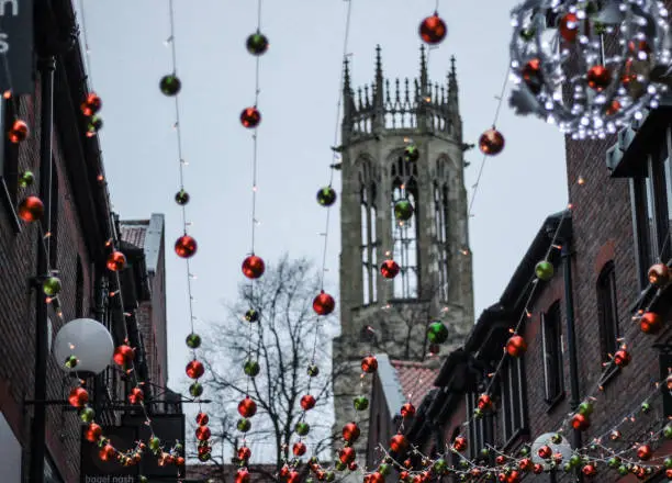 Christmas decorations in York, UK with a back ground of the old castle